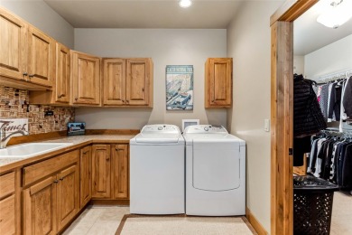 Come explore this stunning single-level residence on the 10th on Eagle Bend Golf Course in Montana - for sale on GolfHomes.com, golf home, golf lot