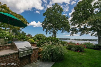 This stunning 5-bedroom, 5.5-bathroom English Tudor waterfront on Navesink Country Club in New Jersey - for sale on GolfHomes.com, golf home, golf lot