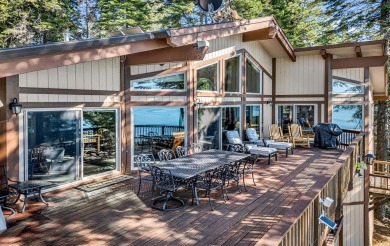 This stunning lakefront home offers panoramic views of Lake on Lake Almanor Country Club in California - for sale on GolfHomes.com, golf home, golf lot
