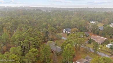 Quaint ranch style 3 bed 3 bathroom brick home on a quiet on Harbour Point Golf Club in North Carolina - for sale on GolfHomes.com, golf home, golf lot