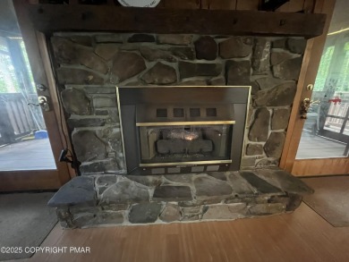 Welcome to this charming log-sided retreat offering 3 bedrooms on The Hideout Golf in Pennsylvania - for sale on GolfHomes.com, golf home, golf lot