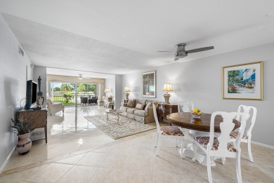 Experience serene living in this inviting 3-bedroom end-unit on  in Florida - for sale on GolfHomes.com, golf home, golf lot