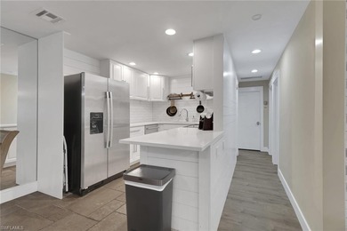 Step into this beautifully remodeled Spanish-style villa in The on The Glades Golf and Country Club in Florida - for sale on GolfHomes.com, golf home, golf lot