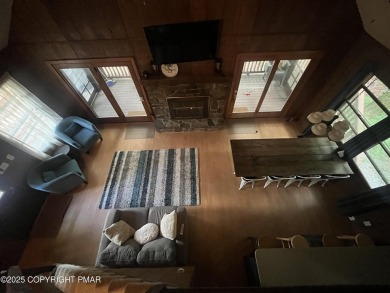 Welcome to this charming log-sided retreat offering 3 bedrooms on The Hideout Golf in Pennsylvania - for sale on GolfHomes.com, golf home, golf lot