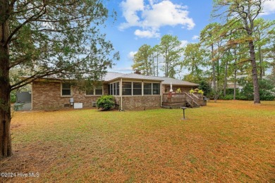 Quaint ranch style 3 bed 3 bathroom brick home on a quiet on Harbour Point Golf Club in North Carolina - for sale on GolfHomes.com, golf home, golf lot