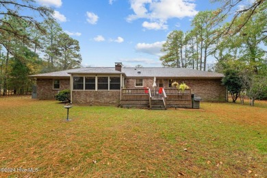 Quaint ranch style 3 bed 3 bathroom brick home on a quiet on Harbour Point Golf Club in North Carolina - for sale on GolfHomes.com, golf home, golf lot