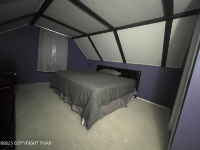 Welcome to this charming log-sided retreat offering 3 bedrooms on The Hideout Golf in Pennsylvania - for sale on GolfHomes.com, golf home, golf lot