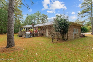 Quaint ranch style 3 bed 3 bathroom brick home on a quiet on Harbour Point Golf Club in North Carolina - for sale on GolfHomes.com, golf home, golf lot