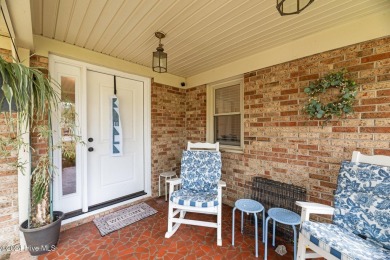 Quaint ranch style 3 bed 3 bathroom brick home on a quiet on Harbour Point Golf Club in North Carolina - for sale on GolfHomes.com, golf home, golf lot