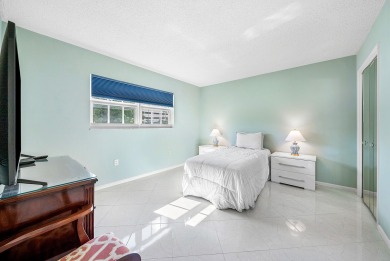 Experience serene living in this inviting 3-bedroom end-unit on  in Florida - for sale on GolfHomes.com, golf home, golf lot