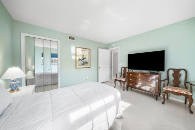 Experience serene living in this inviting 3-bedroom end-unit on  in Florida - for sale on GolfHomes.com, golf home, golf lot