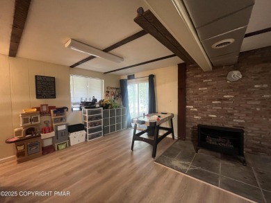 Welcome to this charming log-sided retreat offering 3 bedrooms on The Hideout Golf in Pennsylvania - for sale on GolfHomes.com, golf home, golf lot