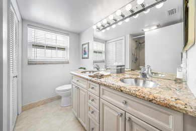 Experience serene living in this inviting 3-bedroom end-unit on  in Florida - for sale on GolfHomes.com, golf home, golf lot