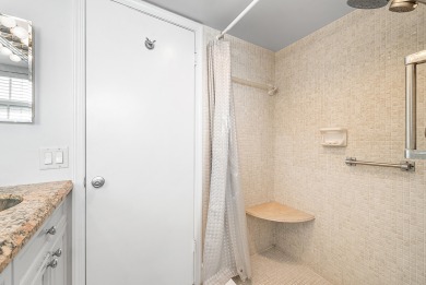 Experience serene living in this inviting 3-bedroom end-unit on  in Florida - for sale on GolfHomes.com, golf home, golf lot