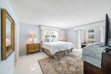 Experience serene living in this inviting 3-bedroom end-unit on  in Florida - for sale on GolfHomes.com, golf home, golf lot