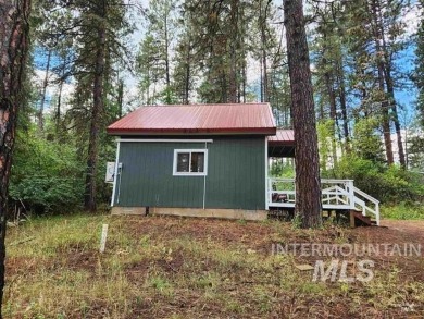 See this adorable little cabin on .64 acre. The best lot in on Terrace Lakes Golf Resort in Idaho - for sale on GolfHomes.com, golf home, golf lot