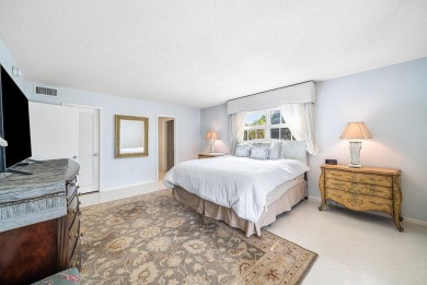 Experience serene living in this inviting 3-bedroom end-unit on  in Florida - for sale on GolfHomes.com, golf home, golf lot