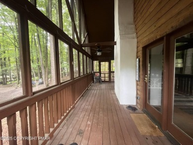Welcome to this charming log-sided retreat offering 3 bedrooms on The Hideout Golf in Pennsylvania - for sale on GolfHomes.com, golf home, golf lot