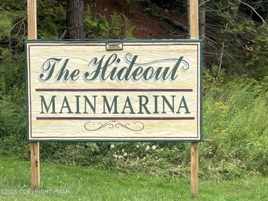 Welcome to this charming log-sided retreat offering 3 bedrooms on The Hideout Golf in Pennsylvania - for sale on GolfHomes.com, golf home, golf lot