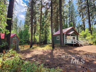 See this adorable little cabin on .64 acre. The best lot in on Terrace Lakes Golf Resort in Idaho - for sale on GolfHomes.com, golf home, golf lot