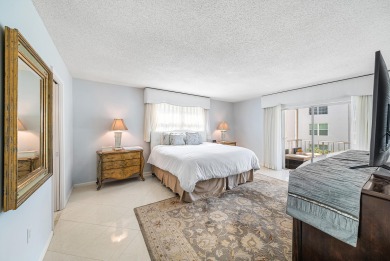 Experience serene living in this inviting 3-bedroom end-unit on  in Florida - for sale on GolfHomes.com, golf home, golf lot