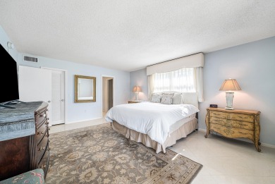 Experience serene living in this inviting 3-bedroom end-unit on  in Florida - for sale on GolfHomes.com, golf home, golf lot