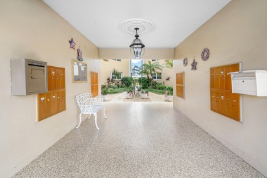 Experience serene living in this inviting 3-bedroom end-unit on  in Florida - for sale on GolfHomes.com, golf home, golf lot