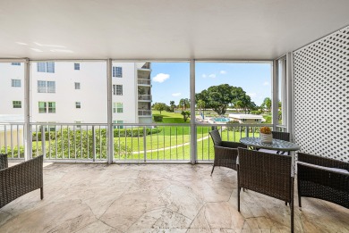 Experience serene living in this inviting 3-bedroom end-unit on  in Florida - for sale on GolfHomes.com, golf home, golf lot
