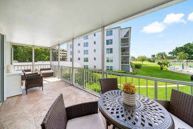 Experience serene living in this inviting 3-bedroom end-unit on  in Florida - for sale on GolfHomes.com, golf home, golf lot