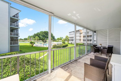 Experience serene living in this inviting 3-bedroom end-unit on  in Florida - for sale on GolfHomes.com, golf home, golf lot