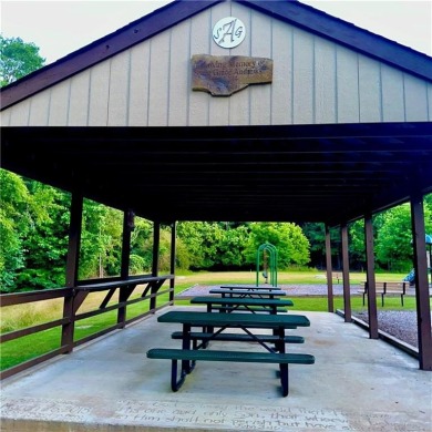 Charming & updated, this 4 BD/2 BA, 1-story ranch in coveted on Moores Mill Golf Club in Alabama - for sale on GolfHomes.com, golf home, golf lot
