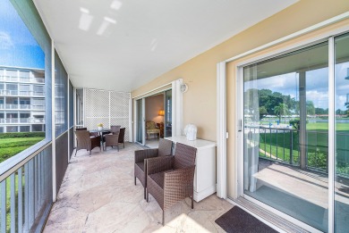 Experience serene living in this inviting 3-bedroom end-unit on  in Florida - for sale on GolfHomes.com, golf home, golf lot