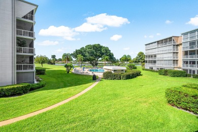 Experience serene living in this inviting 3-bedroom end-unit on  in Florida - for sale on GolfHomes.com, golf home, golf lot