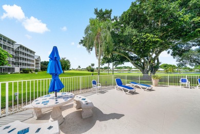 Experience serene living in this inviting 3-bedroom end-unit on  in Florida - for sale on GolfHomes.com, golf home, golf lot