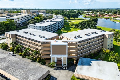 Experience serene living in this inviting 3-bedroom end-unit on  in Florida - for sale on GolfHomes.com, golf home, golf lot