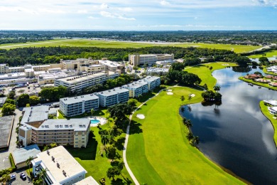 Experience serene living in this inviting 3-bedroom end-unit on  in Florida - for sale on GolfHomes.com, golf home, golf lot