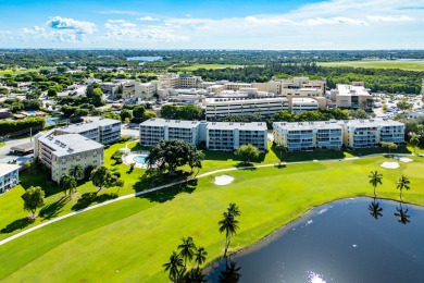 Experience serene living in this inviting 3-bedroom end-unit on  in Florida - for sale on GolfHomes.com, golf home, golf lot