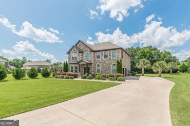 Welcome to 1405 Rainey Way - A Cul-de-Sac Gem in Crystal Lake on Crystal Lake Golf and Country Club in Georgia - for sale on GolfHomes.com, golf home, golf lot