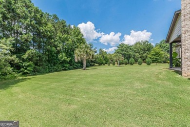 Welcome to 1405 Rainey Way - A Cul-de-Sac Gem in Crystal Lake on Crystal Lake Golf and Country Club in Georgia - for sale on GolfHomes.com, golf home, golf lot