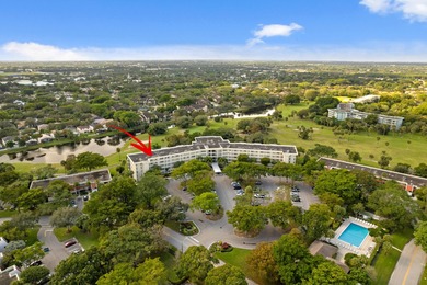 ABSOLUTELY STUNNING WATERFRONT CONDO | BREATHTAKING GOLF COURSE on Palm-Aire Country Club and Resort - The Oaks in Florida - for sale on GolfHomes.com, golf home, golf lot