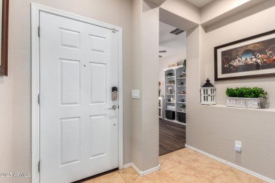 This Raven model shows like a NEW HOME but w/ a HUGE paver patio on Poston Butte Golf Club in Arizona - for sale on GolfHomes.com, golf home, golf lot
