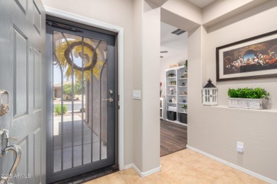 This Raven model shows like a NEW HOME but w/ a HUGE paver patio on Poston Butte Golf Club in Arizona - for sale on GolfHomes.com, golf home, golf lot