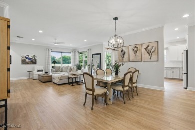Welcome home to this elegant $100k remodel, first-floor on Quail West Golf and Country Club in Florida - for sale on GolfHomes.com, golf home, golf lot