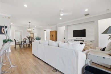 Welcome home to this elegant $100k remodel, first-floor on Quail West Golf and Country Club in Florida - for sale on GolfHomes.com, golf home, golf lot