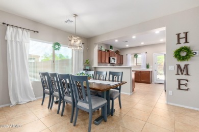 This Raven model shows like a NEW HOME but w/ a HUGE paver patio on Poston Butte Golf Club in Arizona - for sale on GolfHomes.com, golf home, golf lot