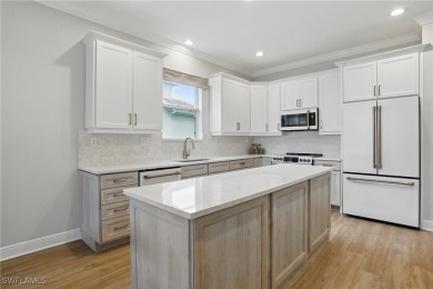 Welcome home to this elegant $100k remodel, first-floor on Quail West Golf and Country Club in Florida - for sale on GolfHomes.com, golf home, golf lot