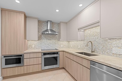 ABSOLUTELY STUNNING WATERFRONT CONDO | BREATHTAKING GOLF COURSE on Palm-Aire Country Club and Resort - The Oaks in Florida - for sale on GolfHomes.com, golf home, golf lot