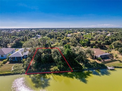 Make your Florida dream come true on this water view lot on a on Rotonda Golf and Country Club The Palms Course in Florida - for sale on GolfHomes.com, golf home, golf lot