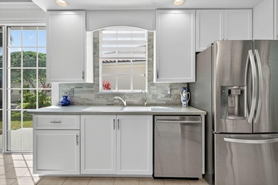 Immaculate 3-Bedroom + office home in the gated Double Tree on Lost Lake Golf Club in Florida - for sale on GolfHomes.com, golf home, golf lot