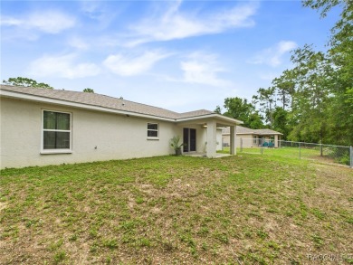 Welcome to this nearly new, beautifully crafted home, built by on Citrus Springs Country Club in Florida - for sale on GolfHomes.com, golf home, golf lot